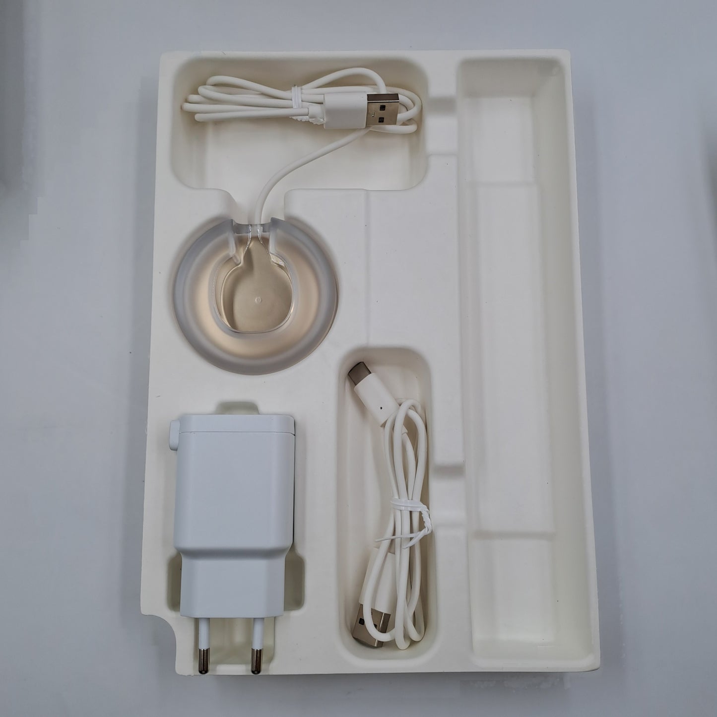 Cepillo de dientes eléctrico sónico Philips Sonicare 9900 Prestige Premium (champán, estuche USB y accesorios)