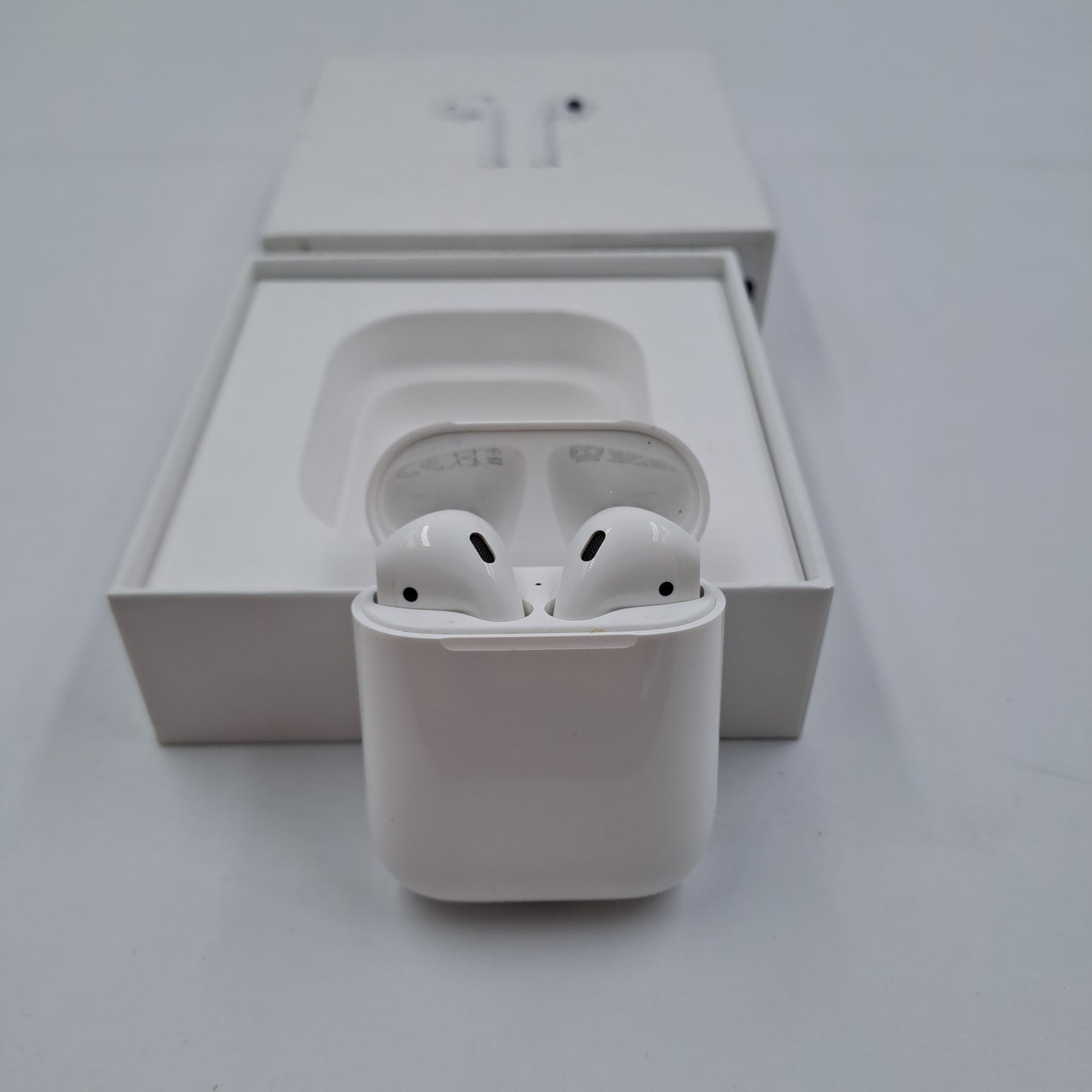 Apple AirPods – Wireless Earphones with Charging Case